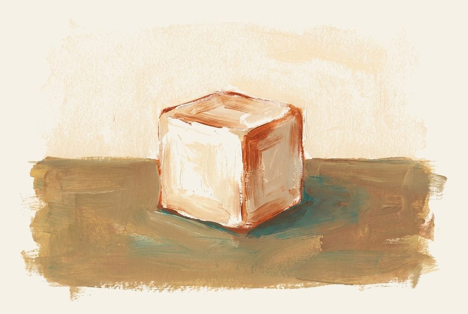 Gouache-painted suikerklontje op een houten oppervlak